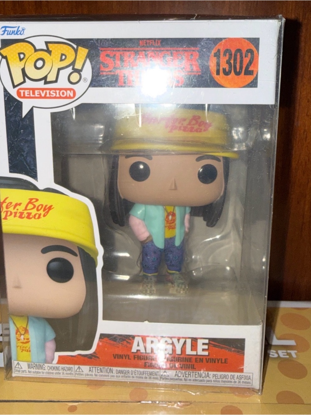 Funko Argyle Vinyl Figure with Yellow Hat and Mint Jacket